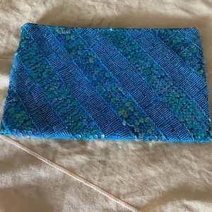 Turquoise sequined clutch, snap buttons closure- new, imported